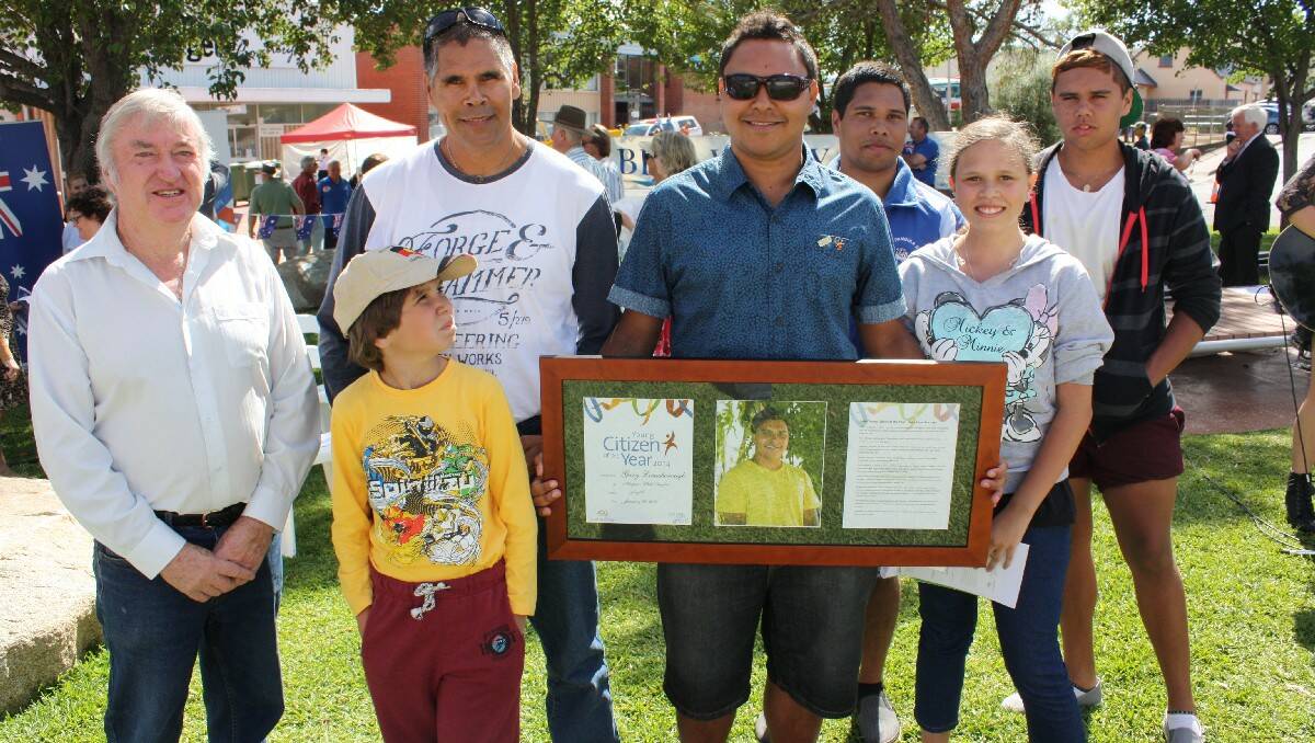 Young Citizen of the Year Gary Lonesborough (middle) with Bega Roosters Rugby League Club president Garry Arkin and his family (from left) Damon, Gary snr, Ryan, Hayleigh and Lochlan.