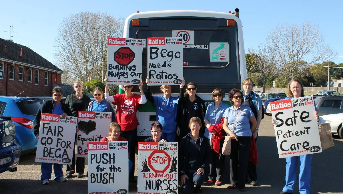 Members of the NSW Nurses and Midwives Association get ready to board their bus to Merimbula to start today’s strike action (from left) Noelene Bell, Jo Graeme, Edith Waterson, Kate Stewart, Di Lang, Sarah Clifton, Kim Coghan, Leonie Bateman, Sally Marshall, Amanda Gilles, (seated from left) Pam Sweeny, Lindy Egan and Trish Tarlinton. 