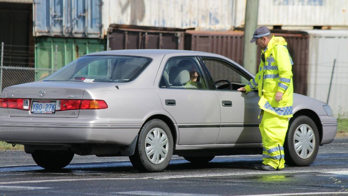 Police set up a roadblock at the North Bega roundabout to divert traffic away from a serious accident on the Princes Hwy at Coopers Gully on Tuesday.