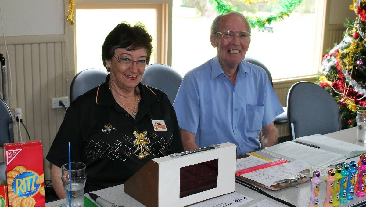 Nola Robinson and Bill Laurie returned to their old bingo-calling seats at the Bega Country Club for the player’s Christmas lunch.