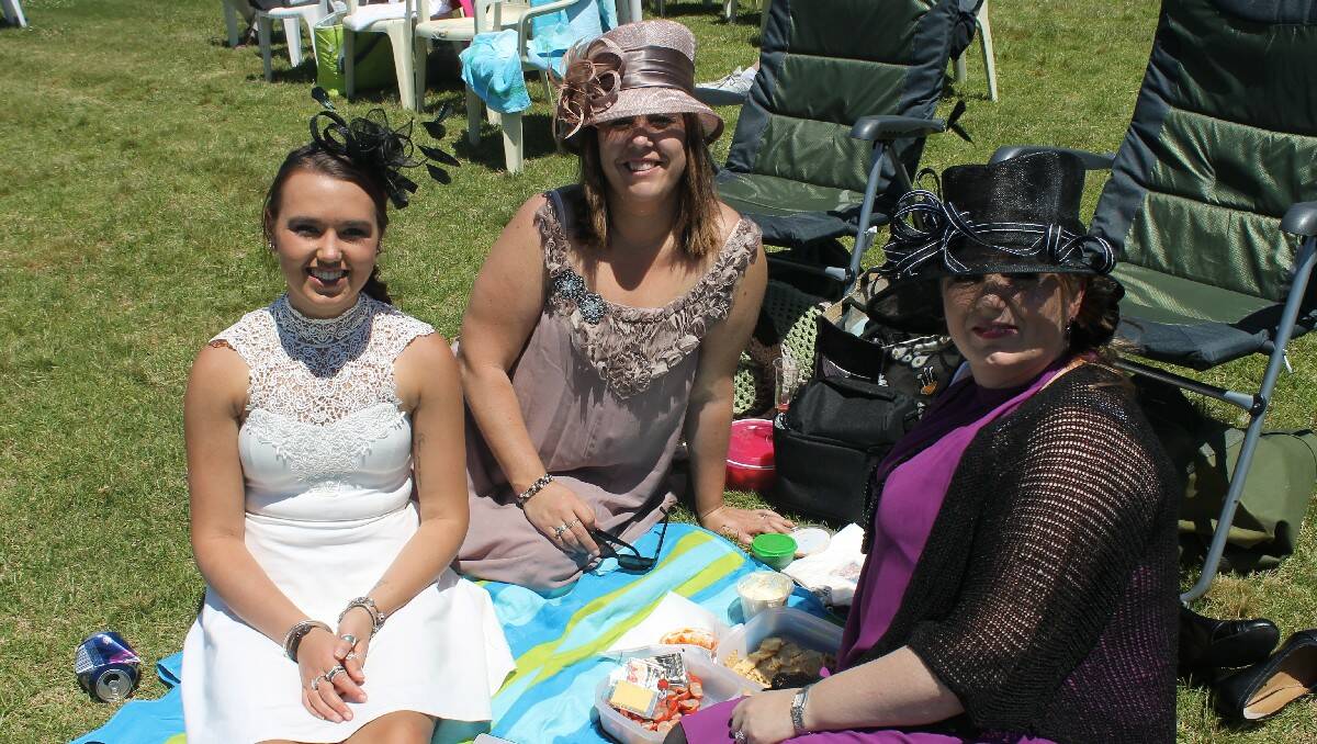 Enjoying a picnic lunch at the races are (from left) Catelin Ndreca, Megan Marshall and Sharon Sirl.