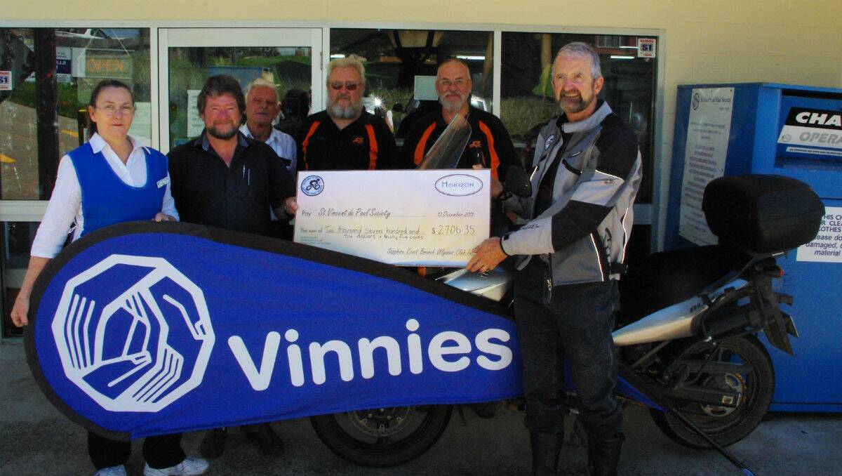 Welcoming the Sapphire Coast branch of the Ulysses Club presentation of the proceeds of its toy run to St Vinnies at the Bega shop are (from left) Mary Nugent, Tony Hergenhan and Bob Sixsmith from St Vinnies and George Parker, James Murray and John  Dean from Ulysses.
