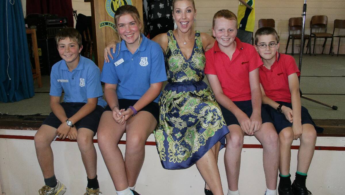 The Bega Valley's Australia Day Ambassador Catriona Rowntree is delighted to meet (from left) Cobargo Public School captains Luke Evans and Marnie Raentz and Quaama PS captains Lachlan Rixon and Taran Cross.