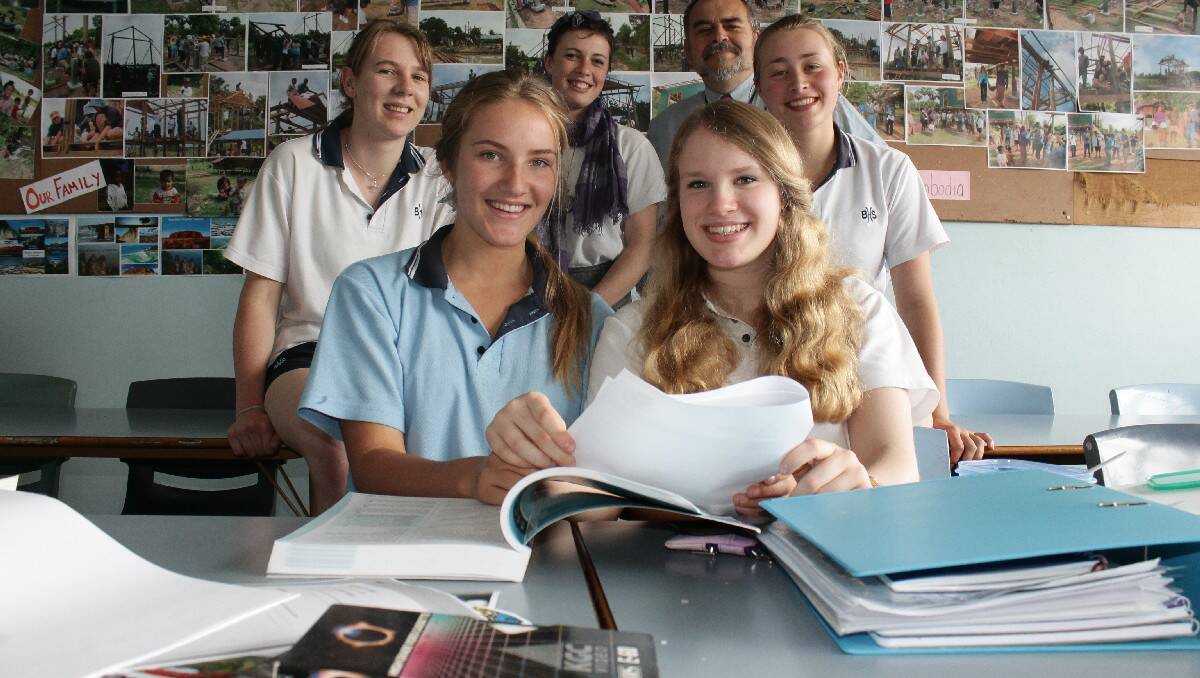 Sarah Campbell (front, right), Siobhan Ison (back, right) and Miriam Zweck (back, left) – pictured during last year’s mock trial competition – are among Bega High's best-performing students in the HSC.