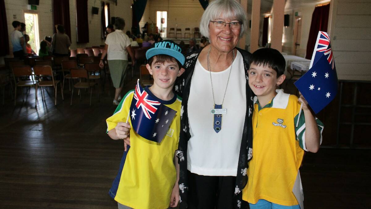 Cobargo CWA branch president Mary Williams and her grandsons Blake (left), 11, and Rhys, 12, show their support on Australia Day.