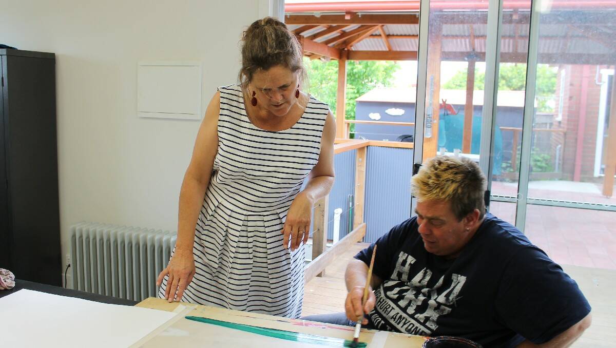 Artist Graeme Smith is learning new techniques with mentor Kylie Ramsay.