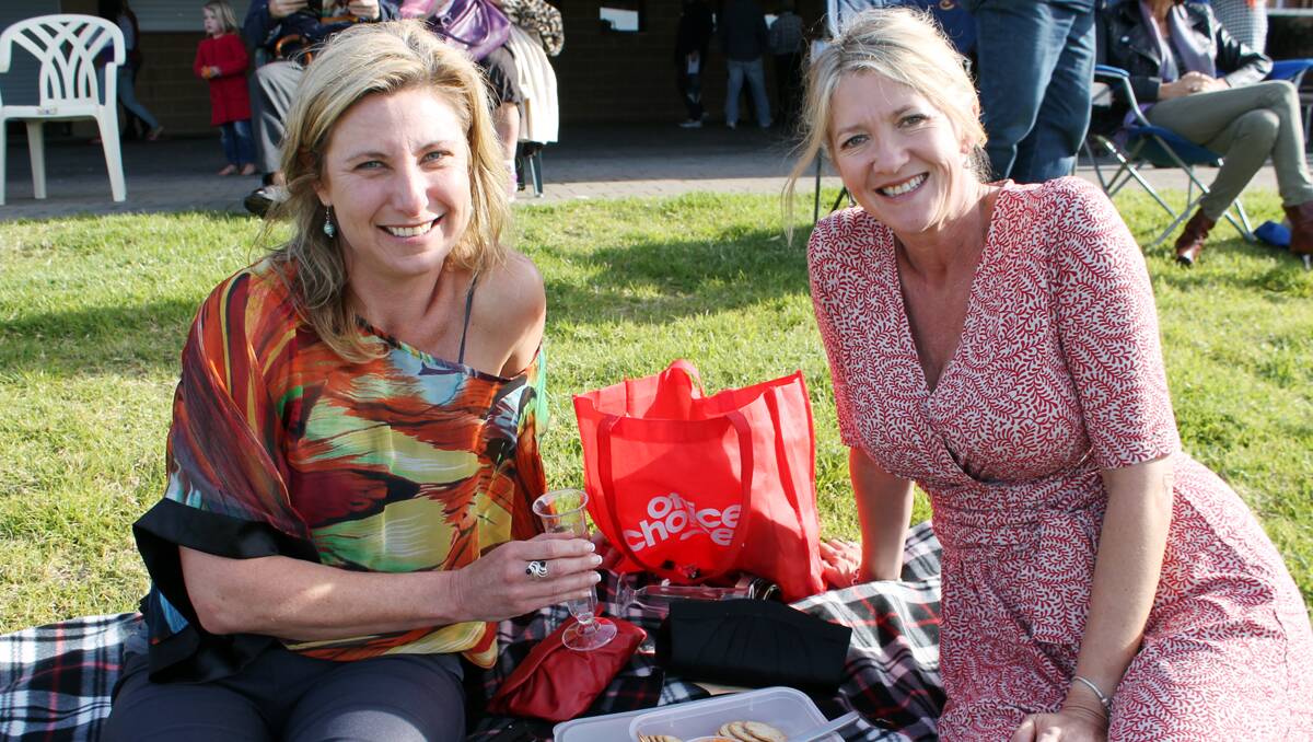 Sharon Clarke of Kalaru and Cheryl Atkinson of Tathra take in the sights of cup day racing.