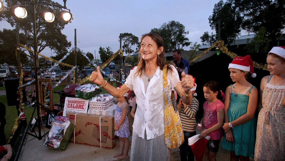 Jill Carter of Bega cheers after winning an outdoor table and chairs in Thursday night’s raffle.