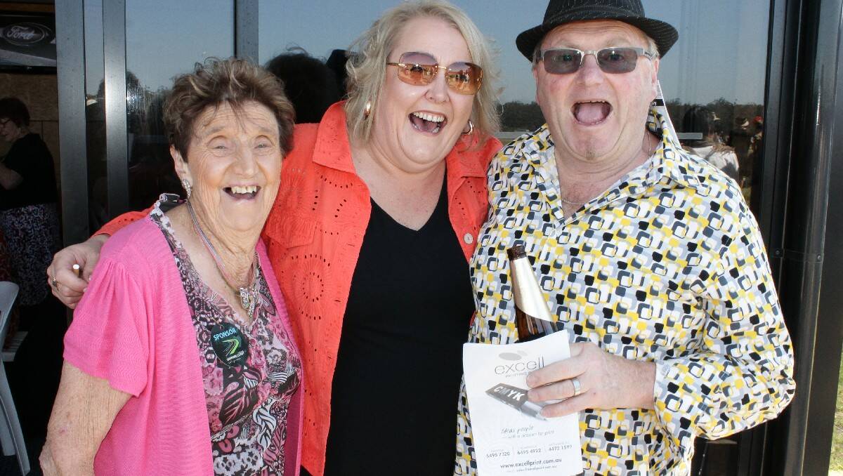  Celebrating their winning bet on Melbourne Cup Day are (from left) Isobel Dixon, Raelene Smith and Graeme Dixon, of Bega.