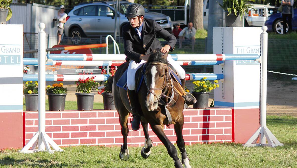 • Lane Clarke rounds the final rail during the Grand Hotel Bega Showjumping Cup.