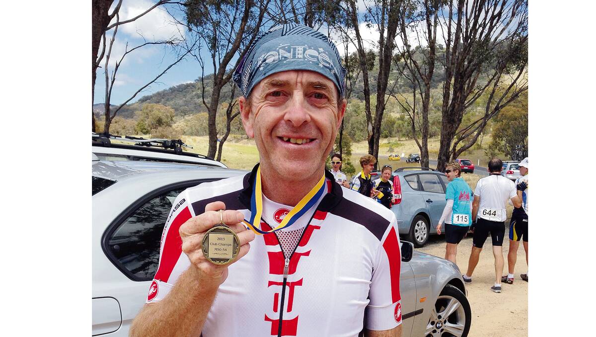 • Bega cyclist Andy Willis with the gold medal he won at the ACT Veterans Cycling Club Championships recently.