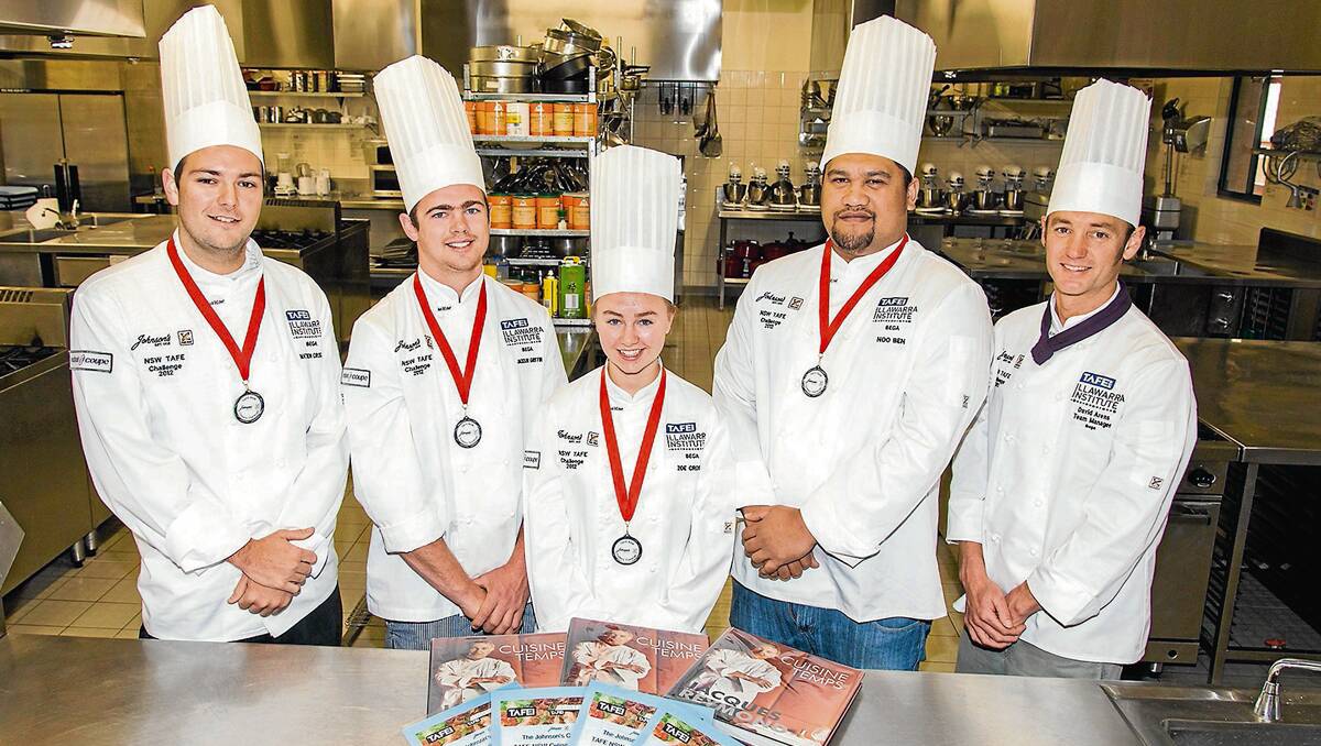 • Showing off their medals and cookery book prizes for success during last week’s TAFE NSW Cooking Challenge are Bega TAFE Commercial Cookery students (from left) Matthew Crossley, Jackson Griffin, Zoe Crosbie, Noo Ben and team manager David Arens. Photo by Robert Hayson. 