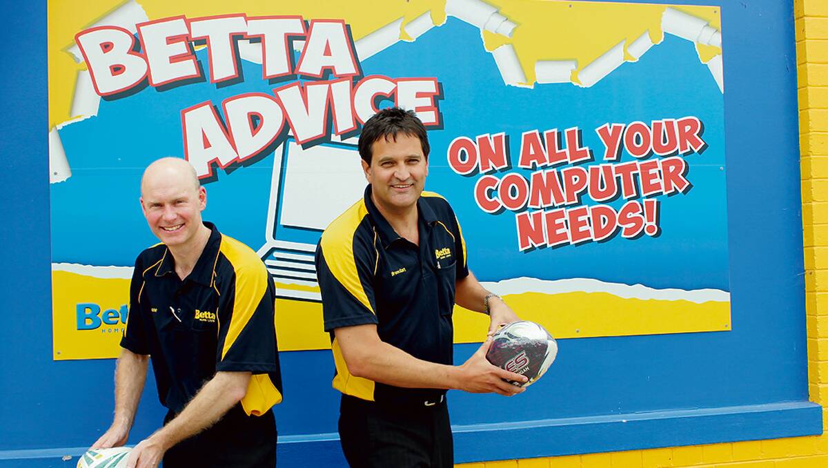 • Bega Betta Home Living managers Shane George (left) and Brendan Buckley are happy to support football in Bega and said it’s great to see more and more ladies taking the field to enjoy the sport. 
