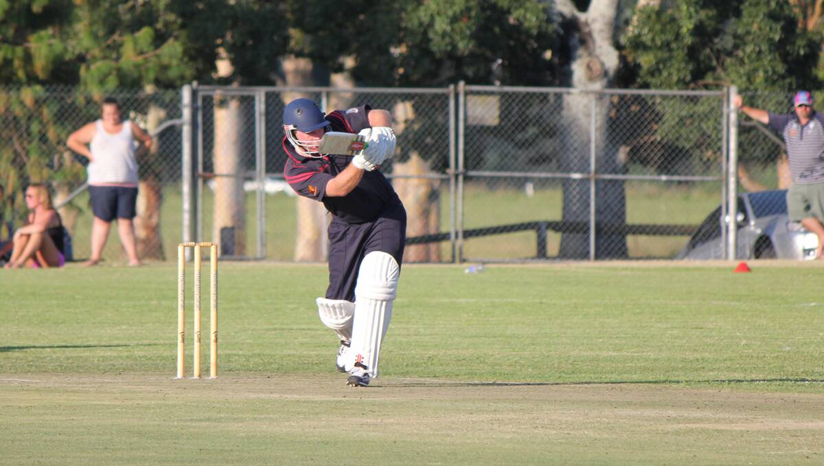Shane Garrett sends the ball for the fence during the Big Bash on Friday. Garrett also helped Pambula to a solid lead on Saturday.