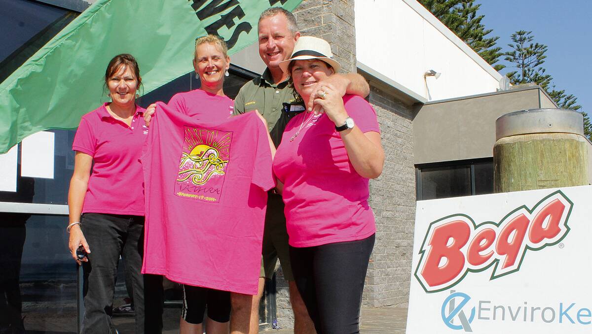 • Sponsor of the 1200m Splash for Cash, Finns Pest Control’s Andrew Warby, receives his Tathra Wharf to Waves shirt from committee members (from left) Therese Wheatley, Anne-Marie Carroll and Linda Badewitz-Dodd.