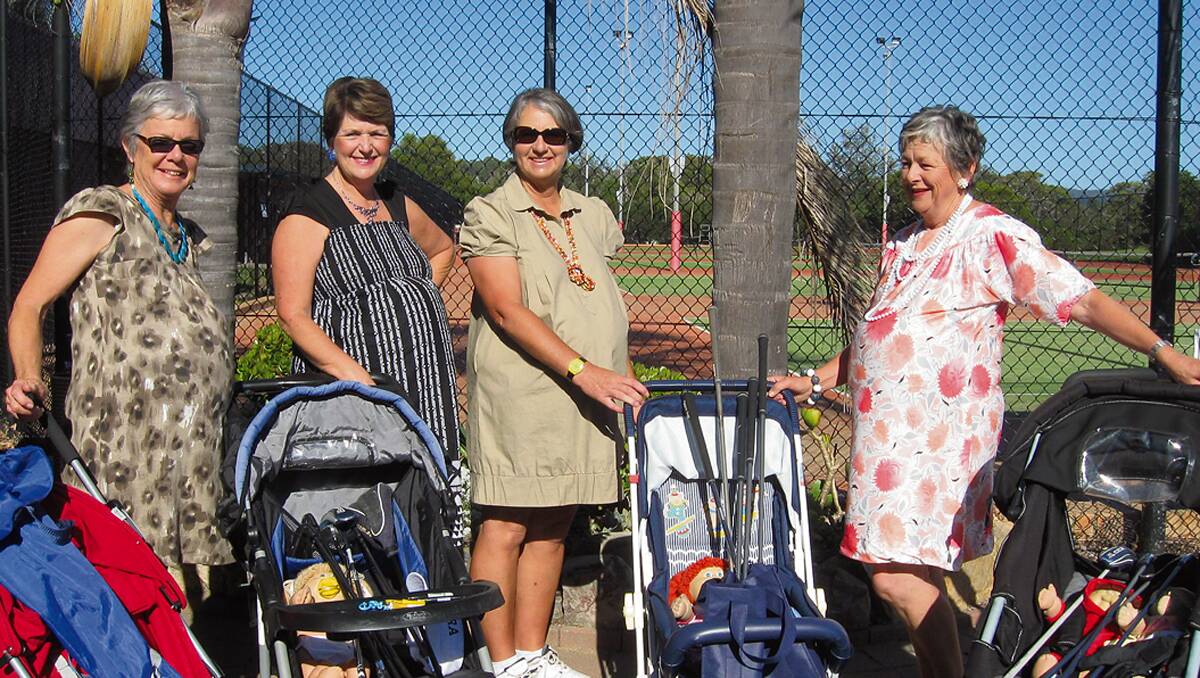 • The golfers dressed in the theme of “the way we were”on the Tathra Beach County Club closing day are (from left) Jo Byrnes, Louise Van Ryn , Denise Falvey and Kaye Murray. They even pushed the prams around the course to add to the fun of the day.