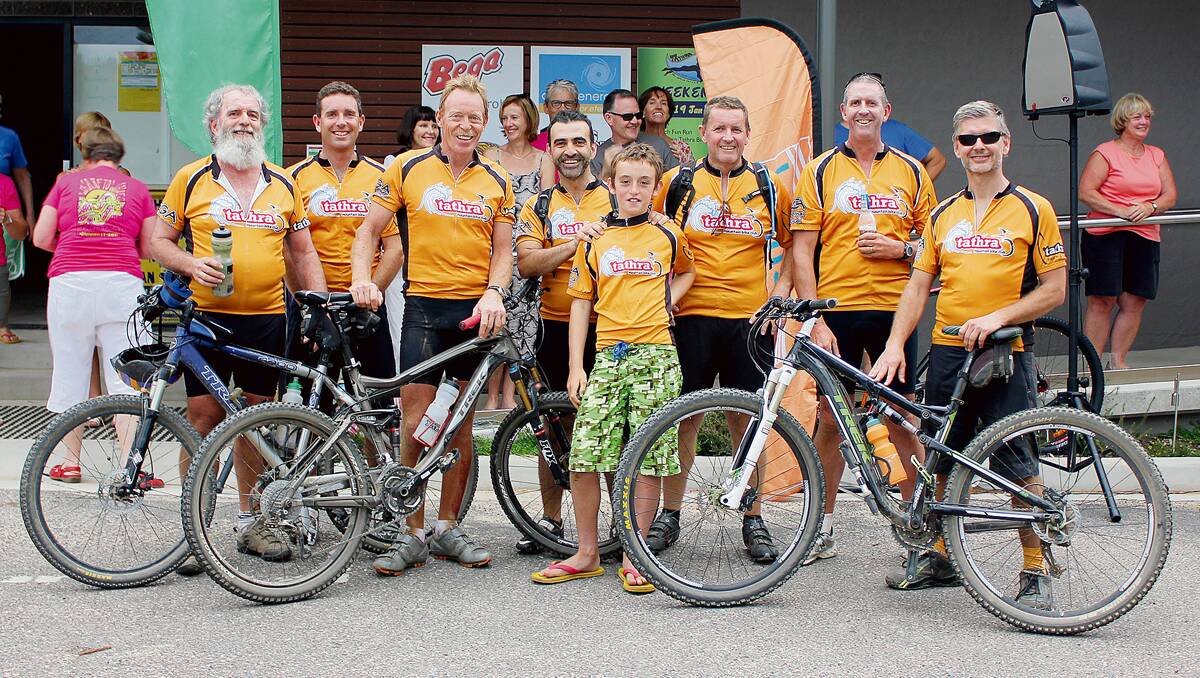 • Tathra Mountain Bike Club members gathering at the finish line after completing the Tathra Wharf to Waves bike ride on Saturday night are (from left) Kym Mogridge, Tom Park, Chris Thomas, John Stylianou, Charlie Todd, Colin Tetley, Brett Roberts and Chris Korvin.