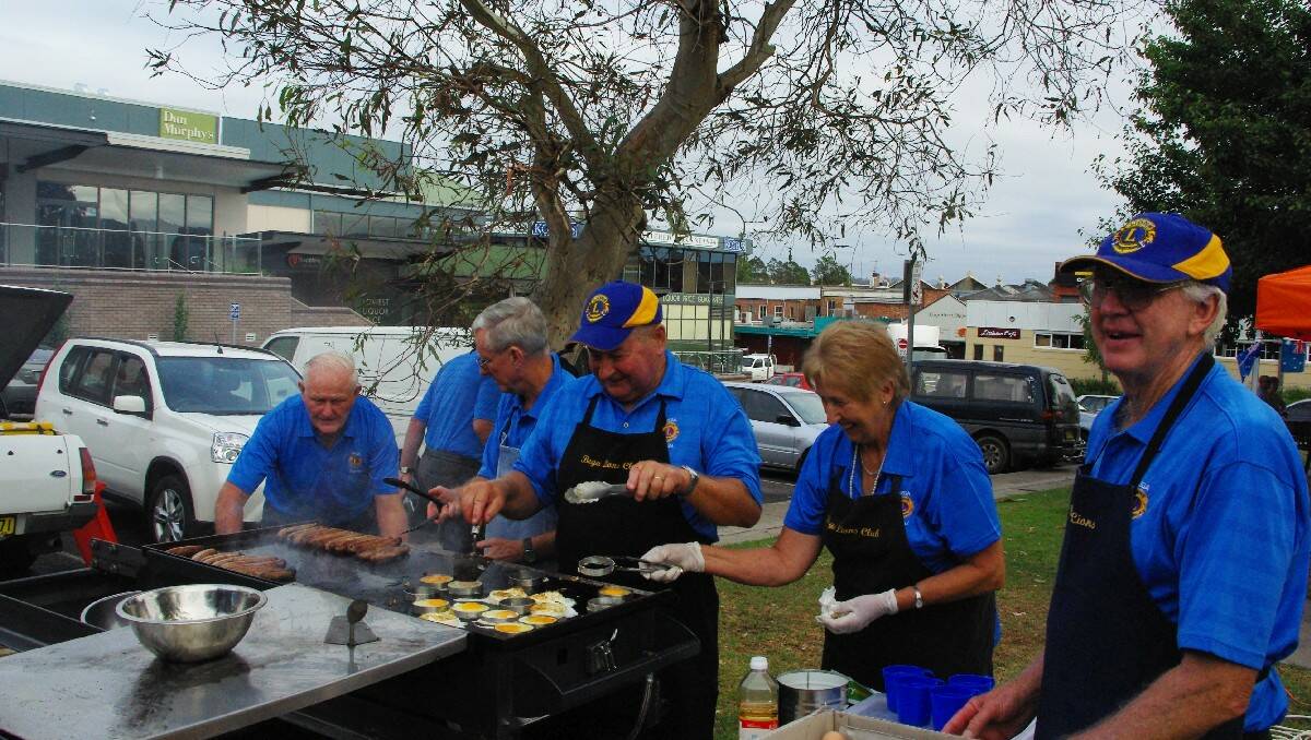  Lions Club members cook breakfast before the Australia Day ceremony in Bega, from left), Dick Wiley, Tony Sturt, Keith Underhill, Alex Langworthy, Carol Wiley and Ross Suter.