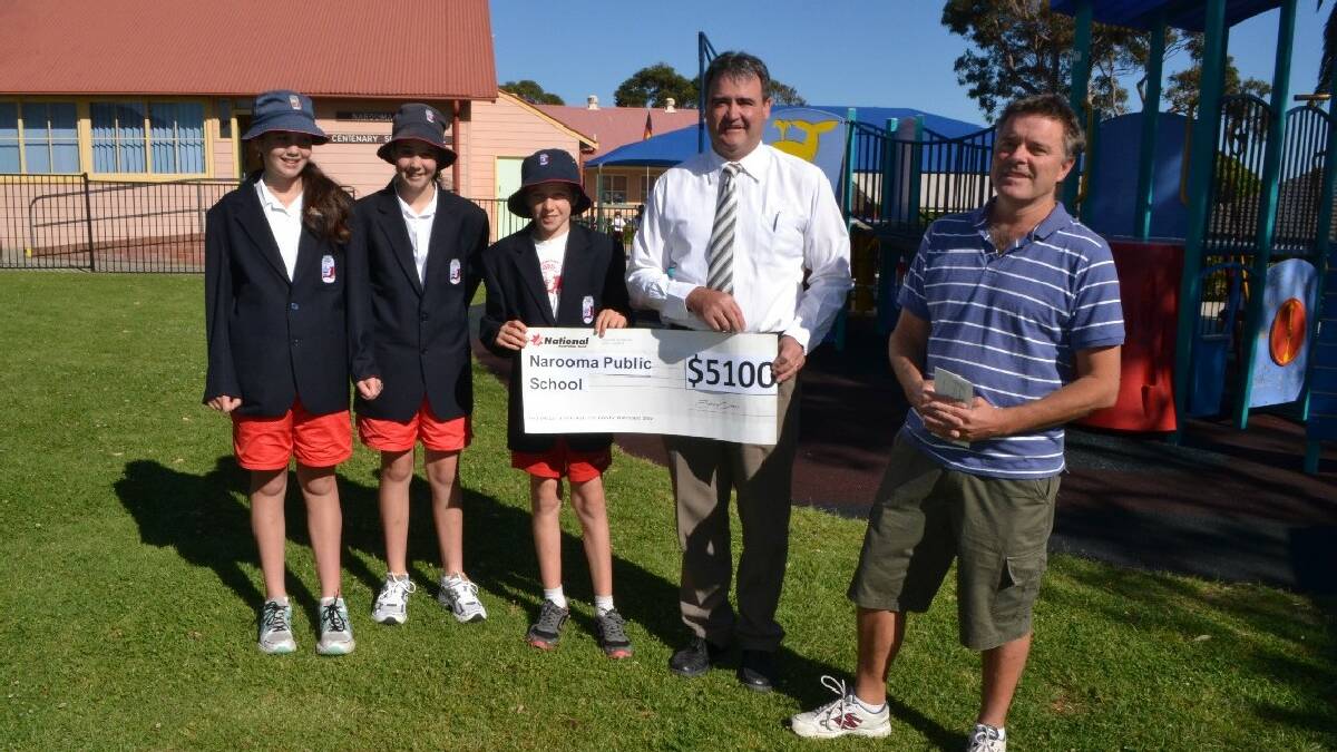 NAROOMA: Narooma Public School captains Sammy and Libby Bate and Rory Spurgeon with Narooma Sporting and Services Club general manager Tony Casu and P&C member Dave Moore and   the big cheque for the new playground roof.