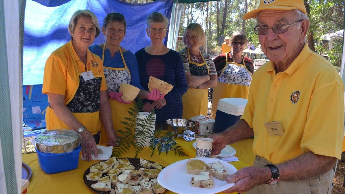 WALLAGA: Serving up freshly baked damper smothered in butter and jam are Montreal Goldfield Heritage Day volunteers Jenny Halliday, Helen Morris, Margaret Kenny-  Levick, Jan Goodrich, Penny Murphy and Ted Hutt.