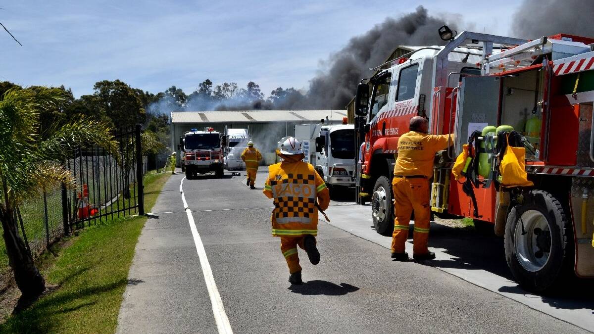NOWRA: Nowra firefighters worked fast to contain a fire that threatened businesses and homes in South Nowra on Thursday.