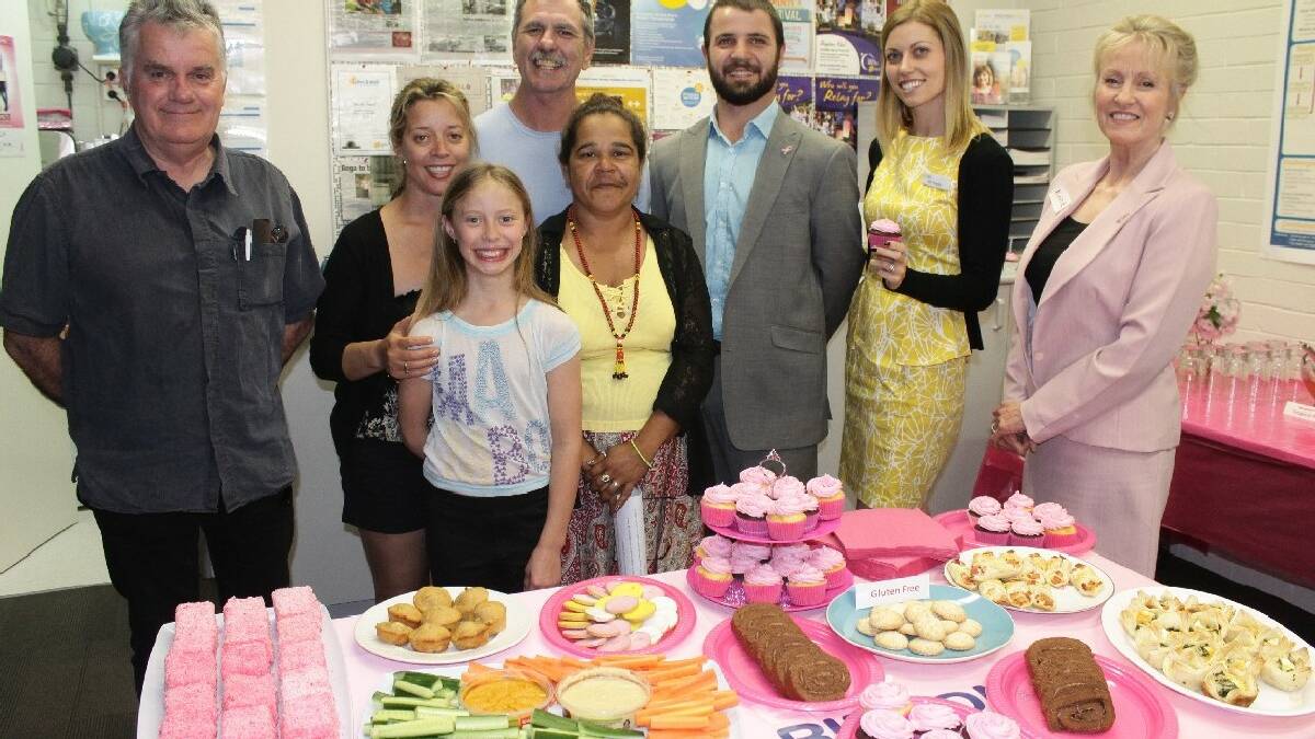 BEGA: Celebrating the Cancer Council Bega office’s second birthday are (from left) Russell Cook, Donna Wade, Gjumurrah Moore, Graham Moore, Sharon Perry, Toby Dawson,   Mia Parsons and Ann Mawhinney.