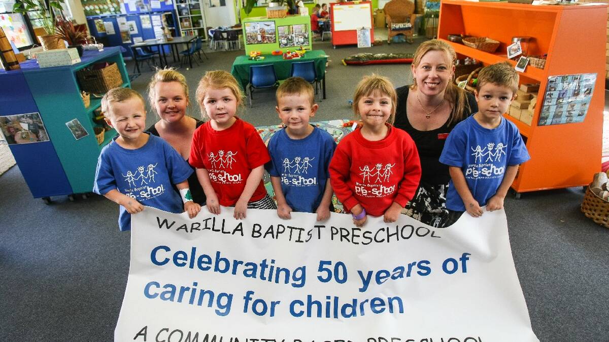 WARILLA: Warilla Baptist Preschool are celebrating 50 years of providing. Pictured are preschoolers Cole, Motbey (left), Lila Miller, Tyronne Revell, Zoe Dunning and Tyne   McGregor with director Karen Bizimovski (left) and administration assistant Michelle Meares. Picture: DYLAN ROBINSON