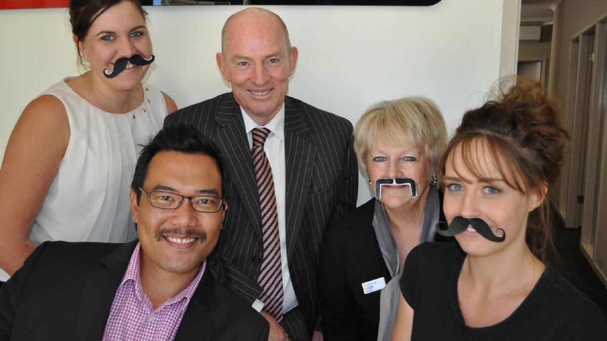 MALUA BAY: Ashleigh Pakis, Mark Maranion, Drew Deck, Jemma Russell and Chris Beadman are preparing for Movember. The LJ Hooker Malua Bay team decided to participate in the   fundraising even in support of colleague Drew Deck, who has battled prostate cancer for the past three years.