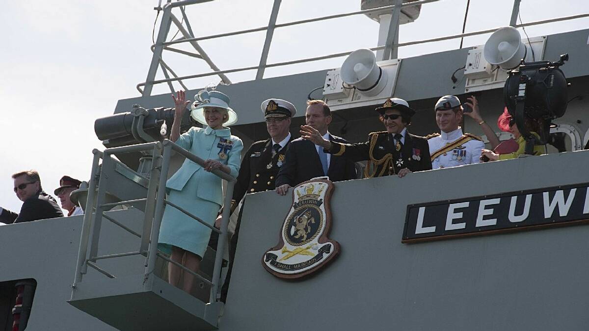 NAROOMA: Narooma’s retired Vice Admiral and former Chief of navy David Shackleton snapped this shot of the dignitaries waving from the deck of the HMAS Leeuwin at the   International Fleet Review on Sydney Harbour.