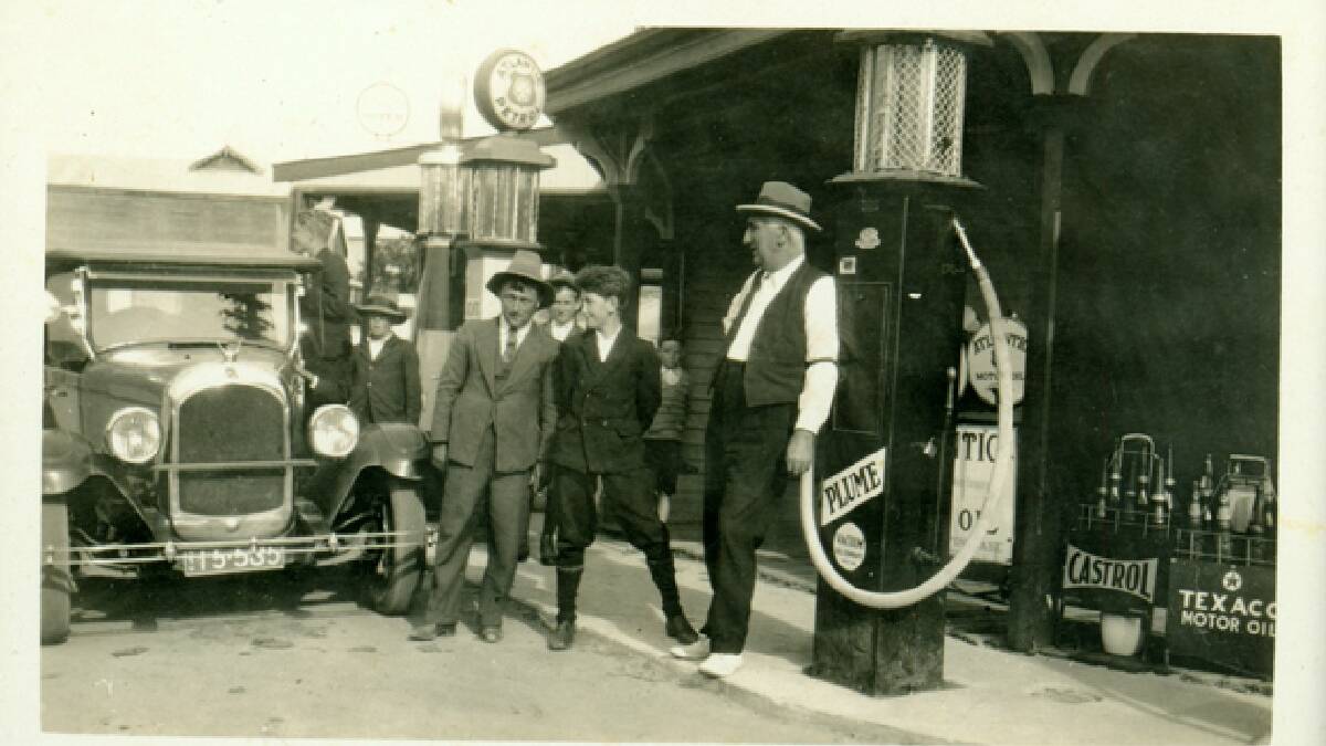 Filling up with petrol at Hobb's General Store, Bemboka, in the 1930s.