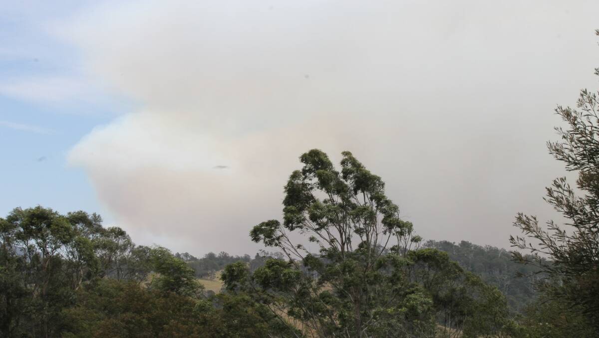 The Brogo fire as seen from Brogo RFS station at start of Warrigal Rg Rd where police road block also was