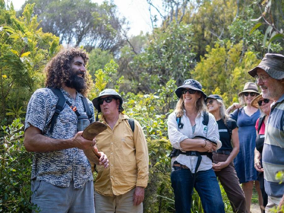 Nathan Lygon, Yuin man, takes people on an immersive cultural walk on country at Twofold Bay, Eden. Picture supplied from Navigate Expeditions. 