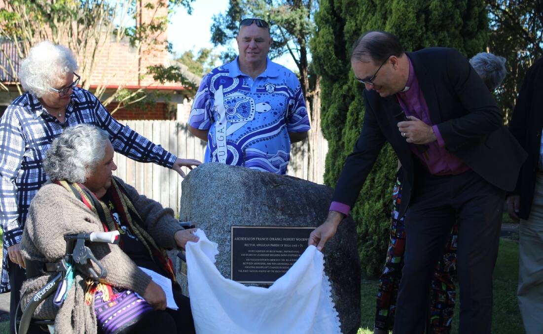 The unveiling: Aunty Colleen, Robyn and Peter Woodwell and Bishop Mark Short standing around Frank Woodwell's plaque. 