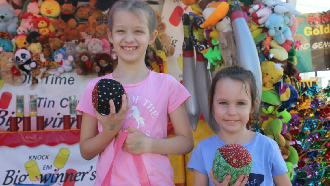 Community festivity: The Bega Show is back and it's bringing back all the fun events, displays and rides. Pictured are April and Ella Perovic at the Bega Show in 2019.
