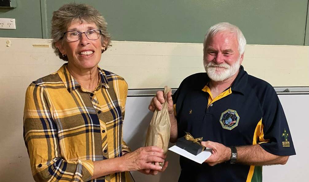 Ann Jones thanks Jim Clark for his many years at the helm of the 1st Merimbula Scouts and Venturers as group leader, 2021. 