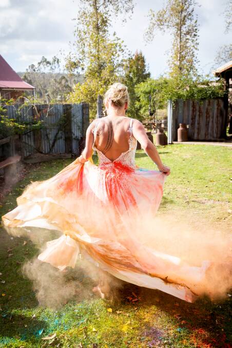 Amandine Ahrens twirls dress around for the finale of the 2023 fashion parade of the Something Blue Wedding Fair event at Oaklands, Pambula. Picture by Daisy Hill Photography. 