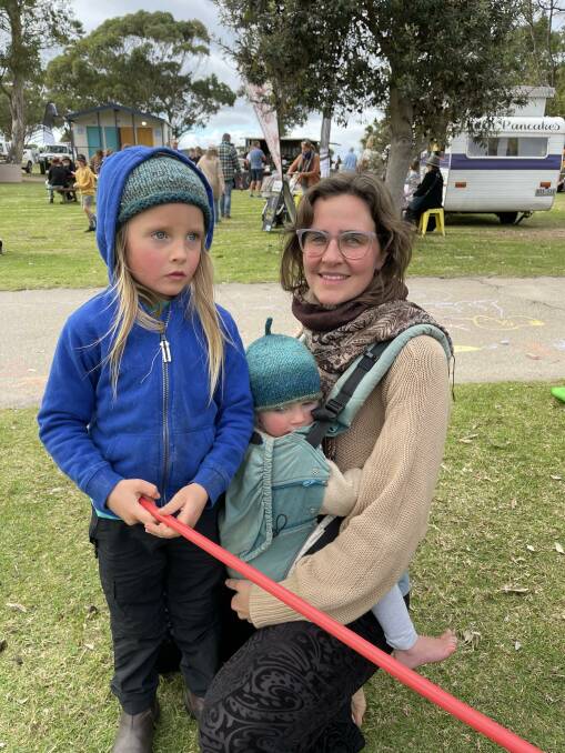 Opal and Ayni with their mother Farrah Fairburn at the Melanoma Awareness Day event in Pambula. Photo: Amandine Ahrens. 