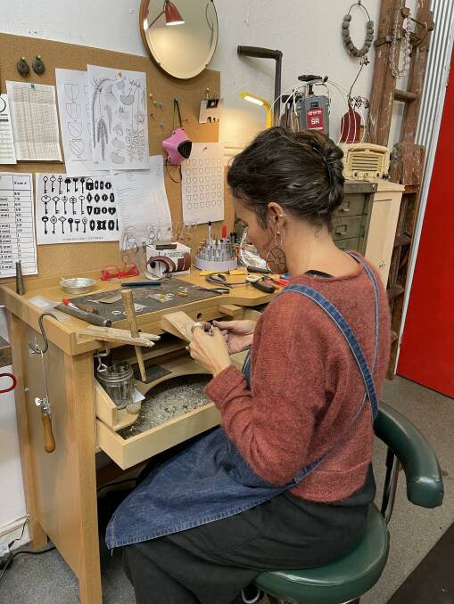 Gabrielle Mcgrath in her workshop at the front of shop of Red Peg. Photo: Amandine Ahrens