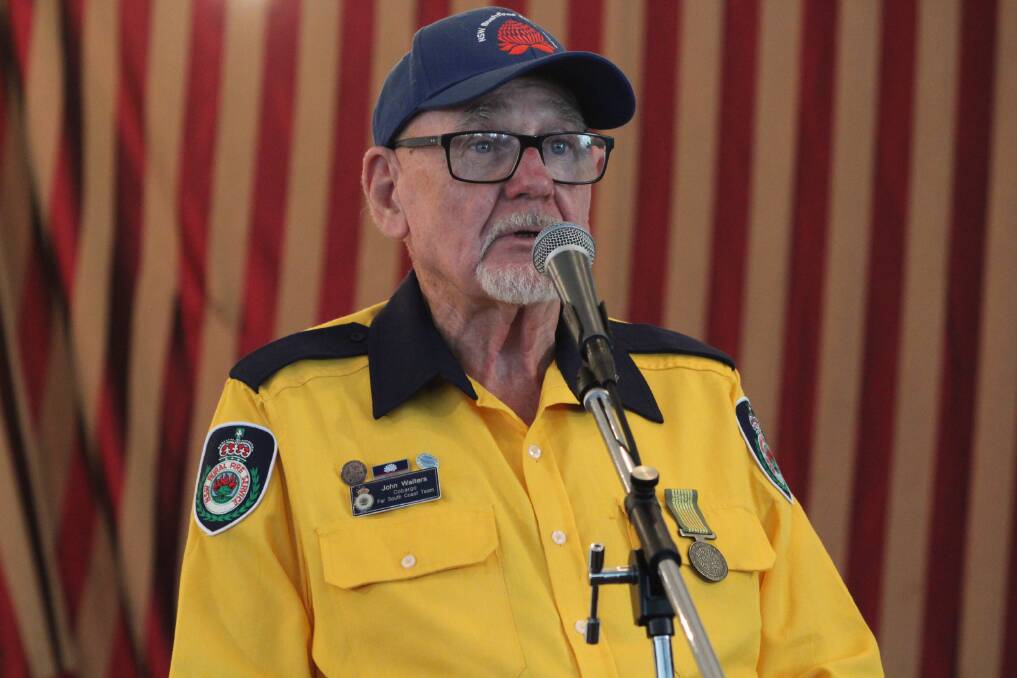 John Walters from Cobargo Rural Fire Service shares a few words at the Cobargo Concert, May 8. 