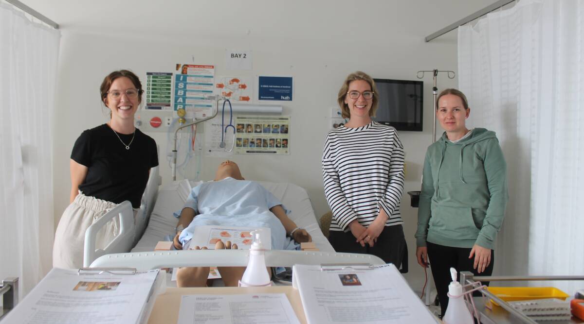 HEALTHY CAREER OPTION: First year nursing students Sophie Stewart, Carly Bremmer and Stephanie Merton gather in the clinical simulation facility at Bega's UOW campus. Photo: Amandine Ahrens