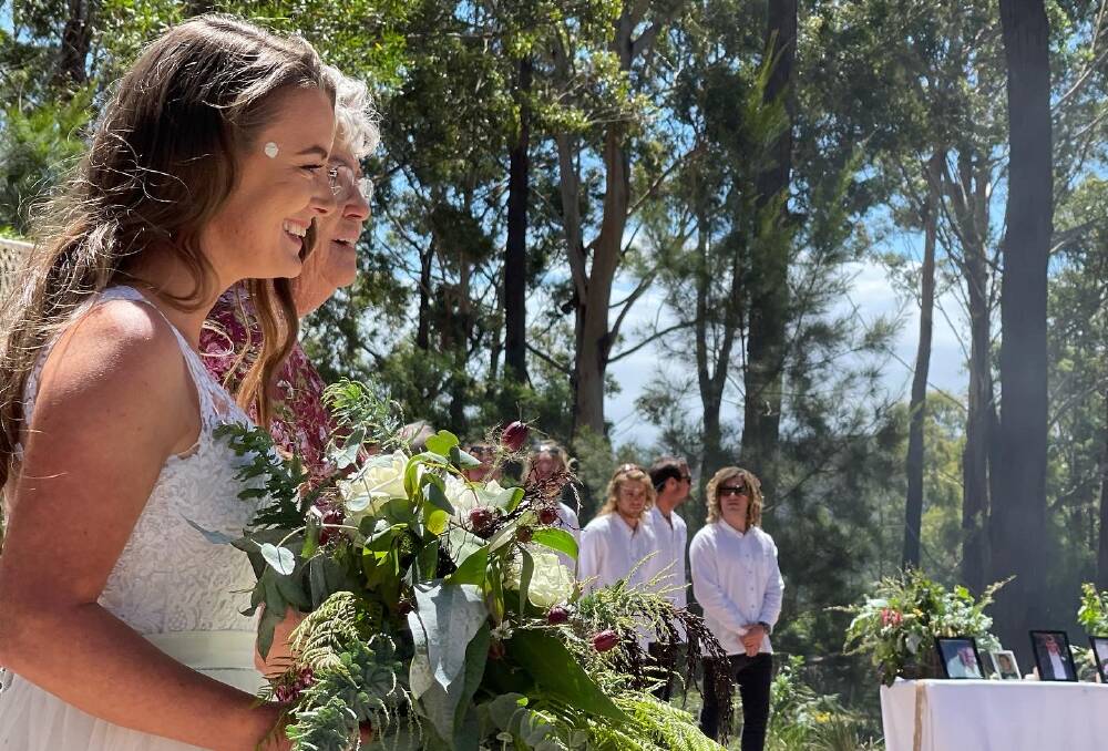 Rochelle Lygon receives warm cheers of excitement as she walks towards the altar. Photo: Amandine Ahrens