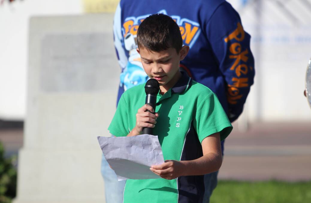 Year five Indigenous student, Kieran Thomas gives student acknowledgement speech for Reconciliation Week at the Littleton Gardens. Photo: Amandine Ahrens