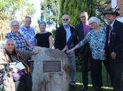 In memory of Frank Woodwell: Local representatives and Frank's children gather around the newly installed plaque at St John's Church, Bega. Photo: Amandine Ahrens