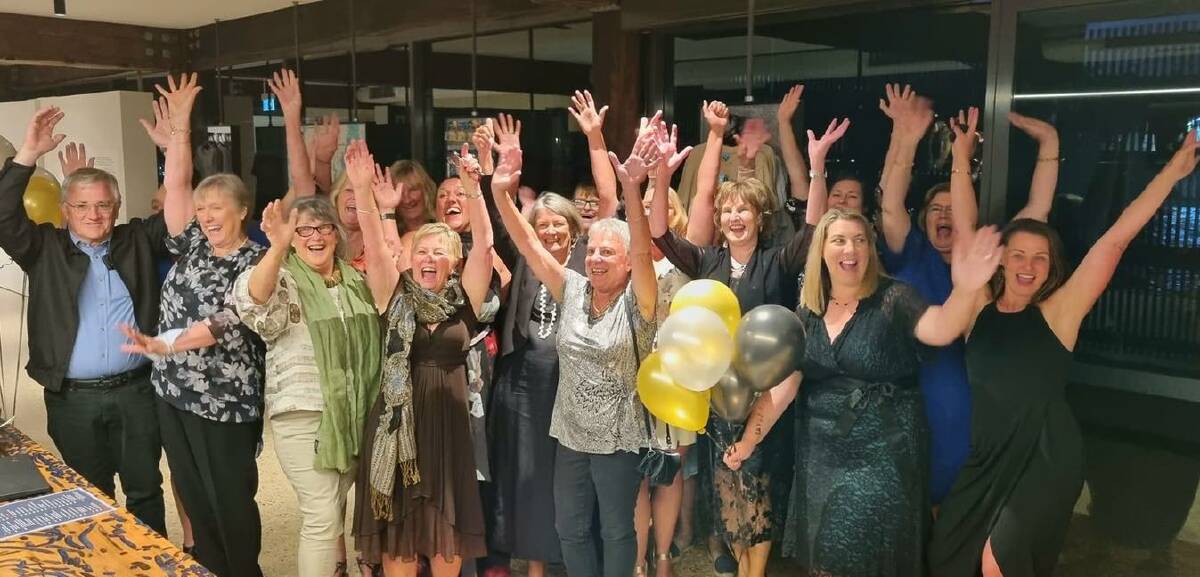 Staff from the Eden Visitor Information Centre celebrate the winning of the NSW Tourism Star Award. Photo supplied.