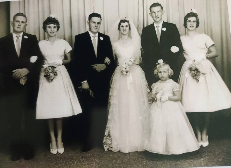Ron and Joy Smith's wedding. Left to right: John Roberts, Norma Sirl, Ron Smith, Joy Smith, Brian Sirl, Janice Wilton. Flower girl - Annette McLennan. Photo supplied