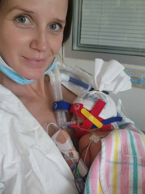 Bec Jessop holds her baby boy Ochre at the Centenary Hospital for Women and Children in Canberra. Picture supplied. 
