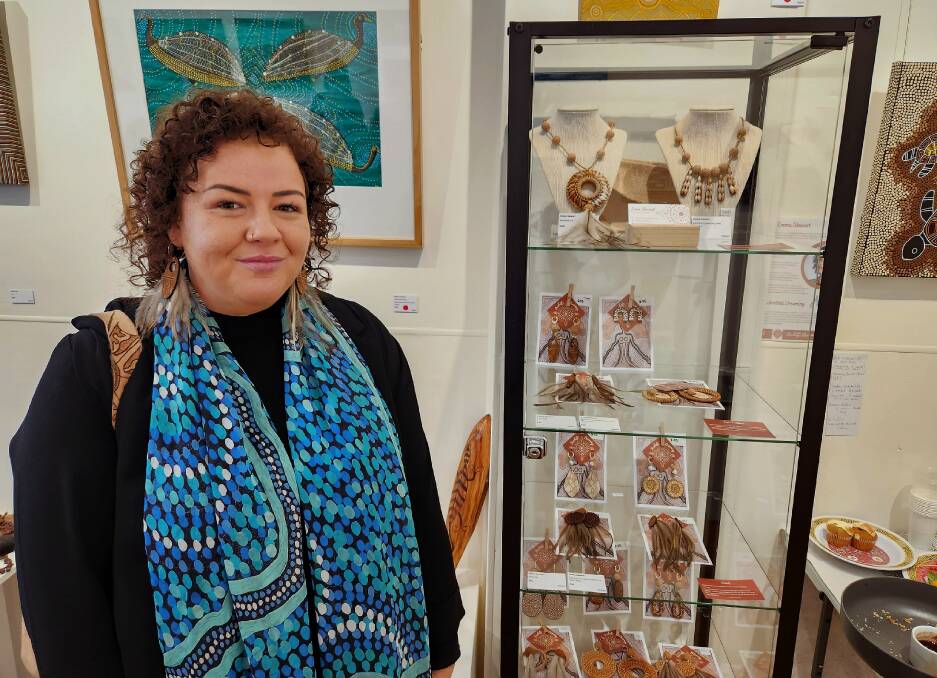 Bidjigal and Gweagal woman and artist, Emma Stewart, presents her jewellery pieces at the South Coast Indigenous Artists Exhibition opening day on August 12, 2023. Picture by Amandine Ahrens