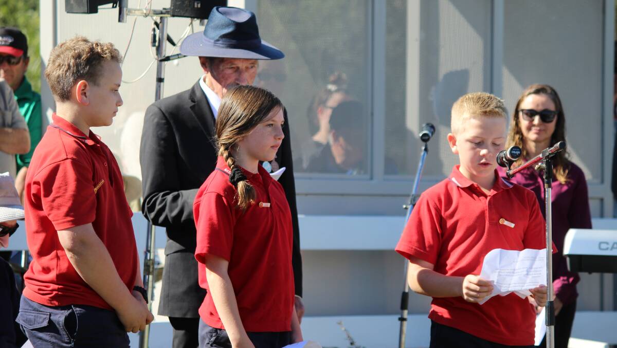 Students from Quaama Public school come forth to present speeches on Anzac Day. Photo: Amandine Ahrens