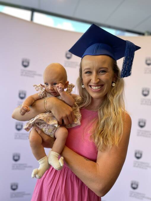 Bega resident and UOW nursing graduate of 2022, Anneliese Hughes with her 3-month-old Lacey Eastick. 