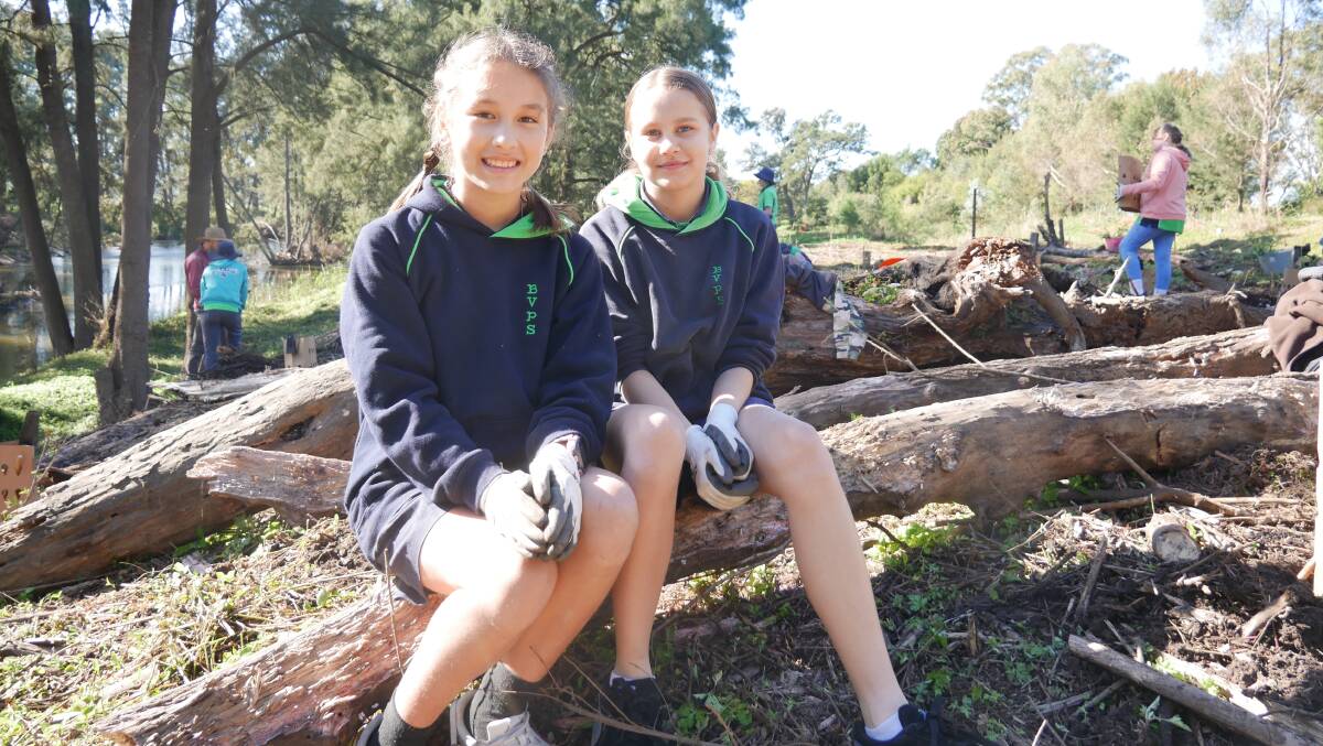 BVPS pupils Nelly and Kailani said the tree-planting activity was hard work. Picture: Ellouise Bailey